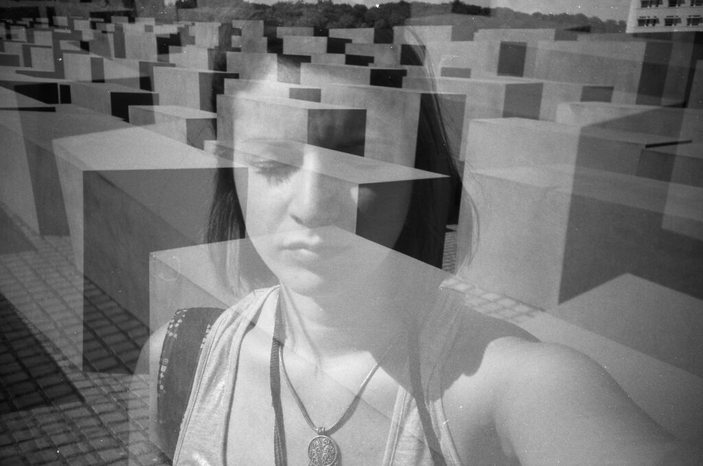 Image of a Woman with blocks in the bacground